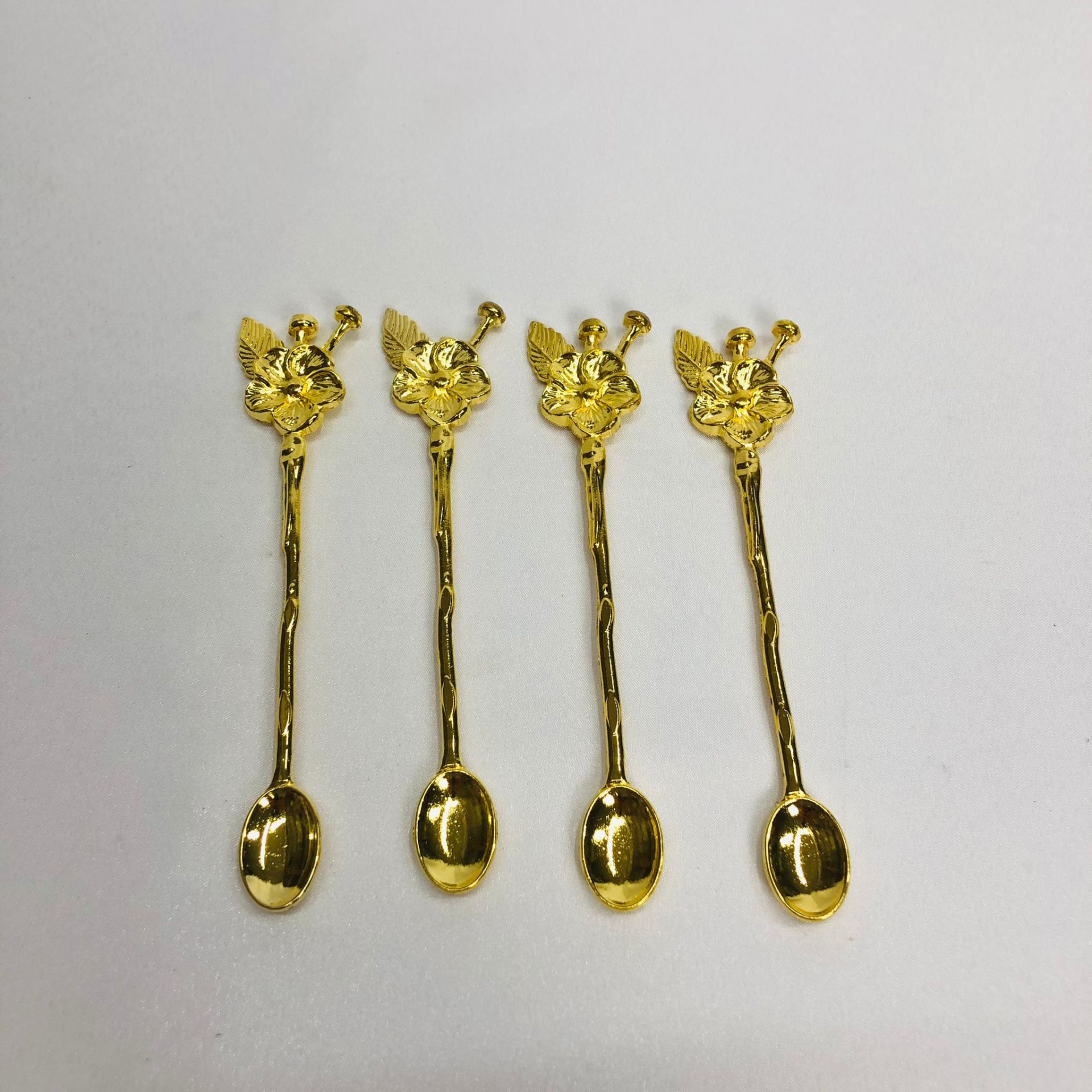 GÜL FİGÜRLÜ UZUN KAŞIK Gold