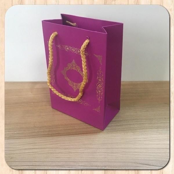 12x17x7 Ölçülü Mor Üzerine Gold Saray Desenli Karton Çanta